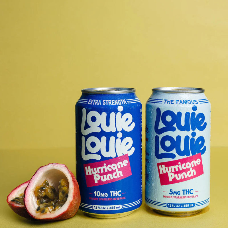 Two cans of Louie Louie Hurricane Punch with a passion fruit on a yellow background