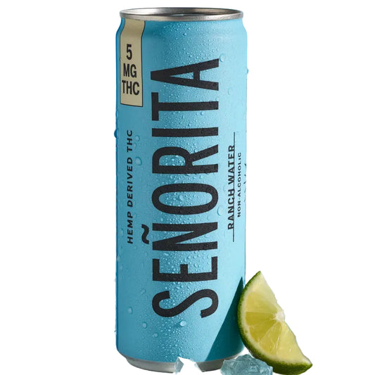 Blue can of Senorita Ranch Water with a lime wedge on a blue background
