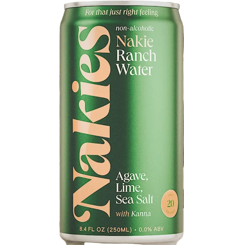 A green can of Naklie Ranch Water with cream and white lettering, set against a background of dried agave leaves.