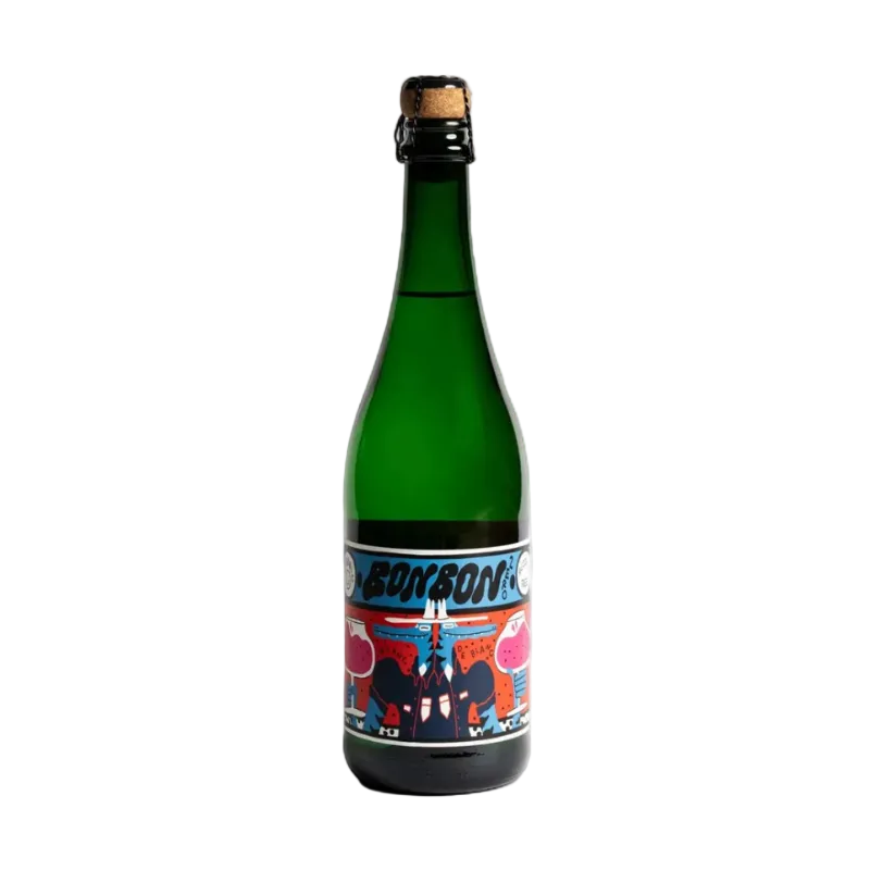 A green glass bottle of Bombalk stout with a colorful label, standing on a white background with a soft shadow.