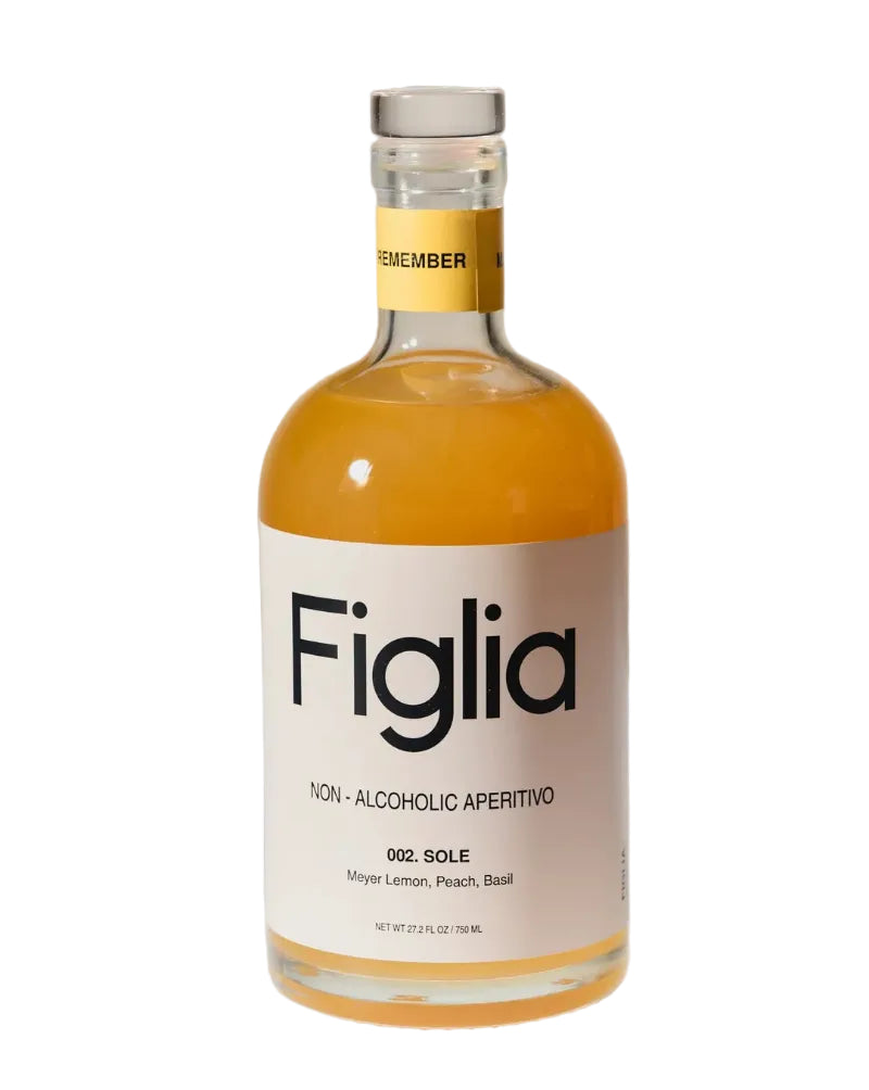 Bottle of Figlia non-alcoholic aperitivo on a white surface with a beige background